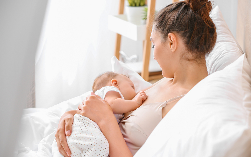 Mother breastfeeding baby 